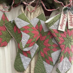 Antique 1860s quilt made into vintage Christmas stockings
