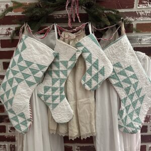 Green and white quilt made into vintage Christmas stockings