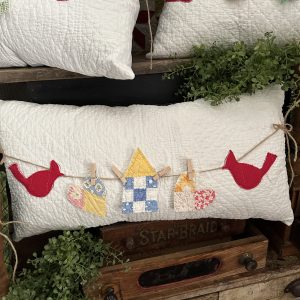 vintage quilt with little house and hearts