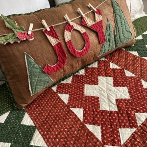 vintage cabin quilt pillow with joy