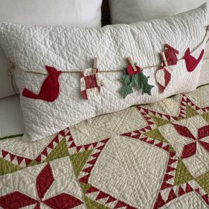 vintage quilt pillow with charms