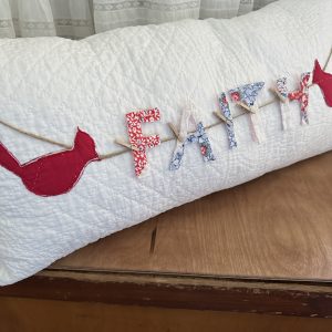 vintage quilt pillow with faith
