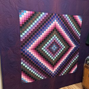 antique amish sunshine shadow quilt