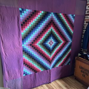 antique amish sunshine shadow quilt