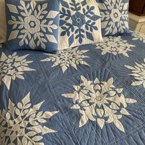 blue and white snowflake vintage pillow sham